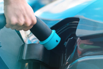 Electro car charger with two plugged in pistol